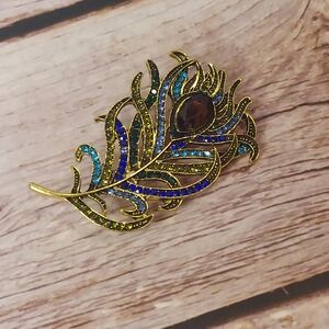 Elegant Gold and Blue Peacock Feather Brooch